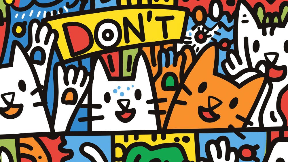 Close-up detail of street art cats graffiti mural wallpaper showing colorful pop art design