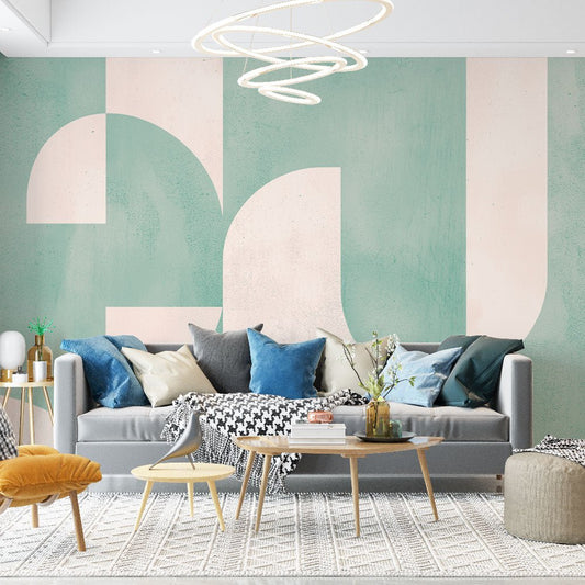 Art Deco geometric mural wallpaper with mint green curves in modern living room setting