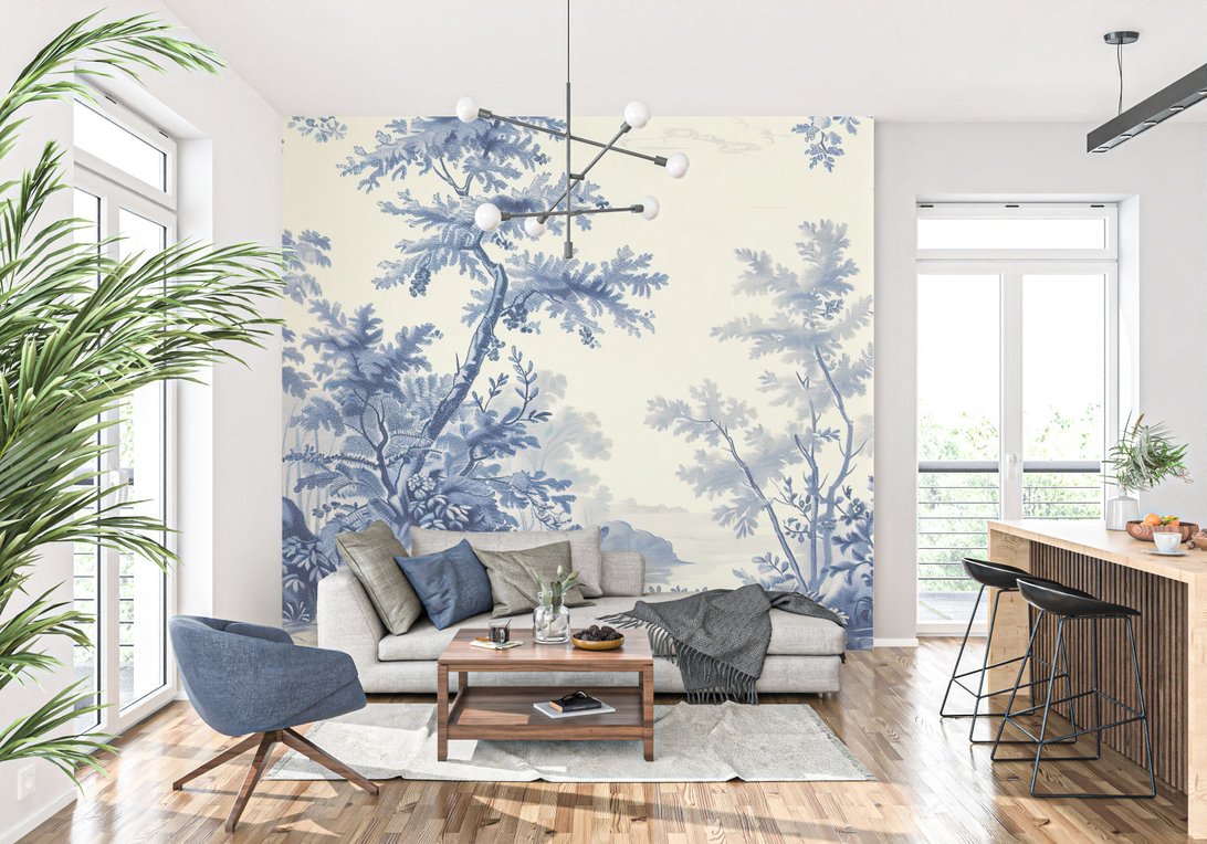 Blue Toile de Jouy tree mural wallpaper in modern living room with grey sofa and plants