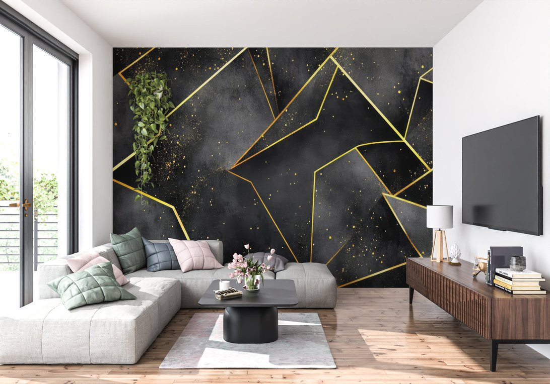 Modern geometric mural wallpaper with black and gold angular design in contemporary living room