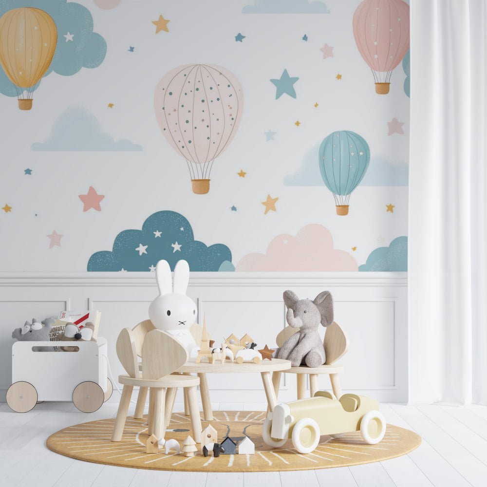 Hot air balloon nursery mural wallpaper with pastel design and Scandinavian furniture setting