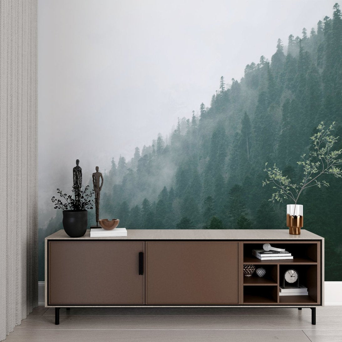 Forest mural wallpaper showcased with modern brown sideboard and decorative accessories