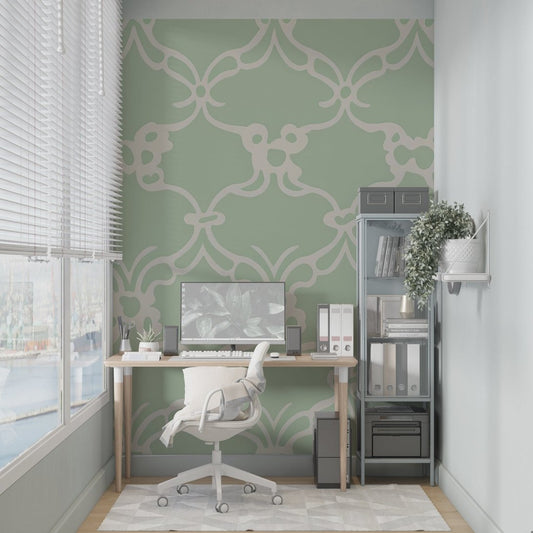 Art Deco geometric mural wallpaper in sage green and beige shown in modern home office setting
