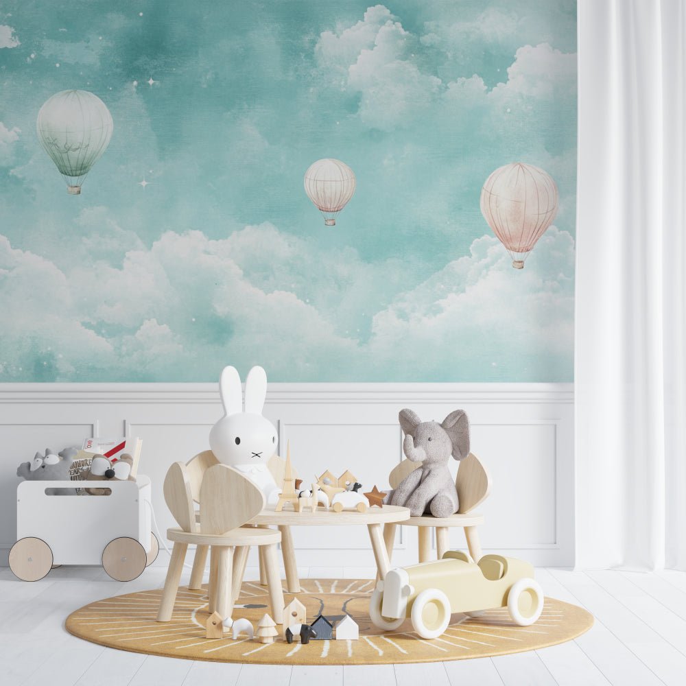 Hot air balloon nursery mural wallpaper in turquoise with wooden children's furniture