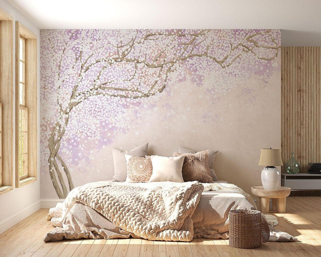 Japanese Cherry Blossom mural wallpaper in cozy bedroom with neutral decor and knitted throw