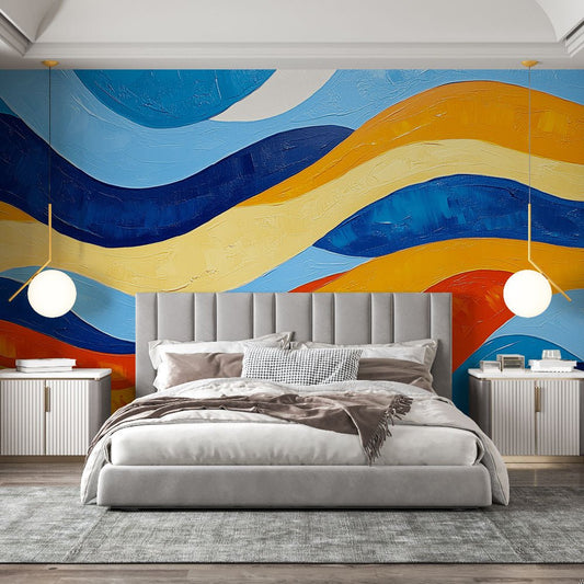 Abstract wave mural wallpaper in blue and orange displayed in a modern bedroom setting with grey bed