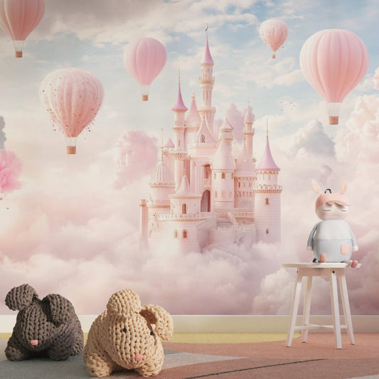 Princess castle mural wallpaper with pink hot air balloons in a nursery setting with plush toys
