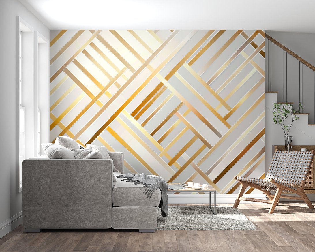 Modern living room featuring geometric Art Deco mural wallpaper with gold lines on white background