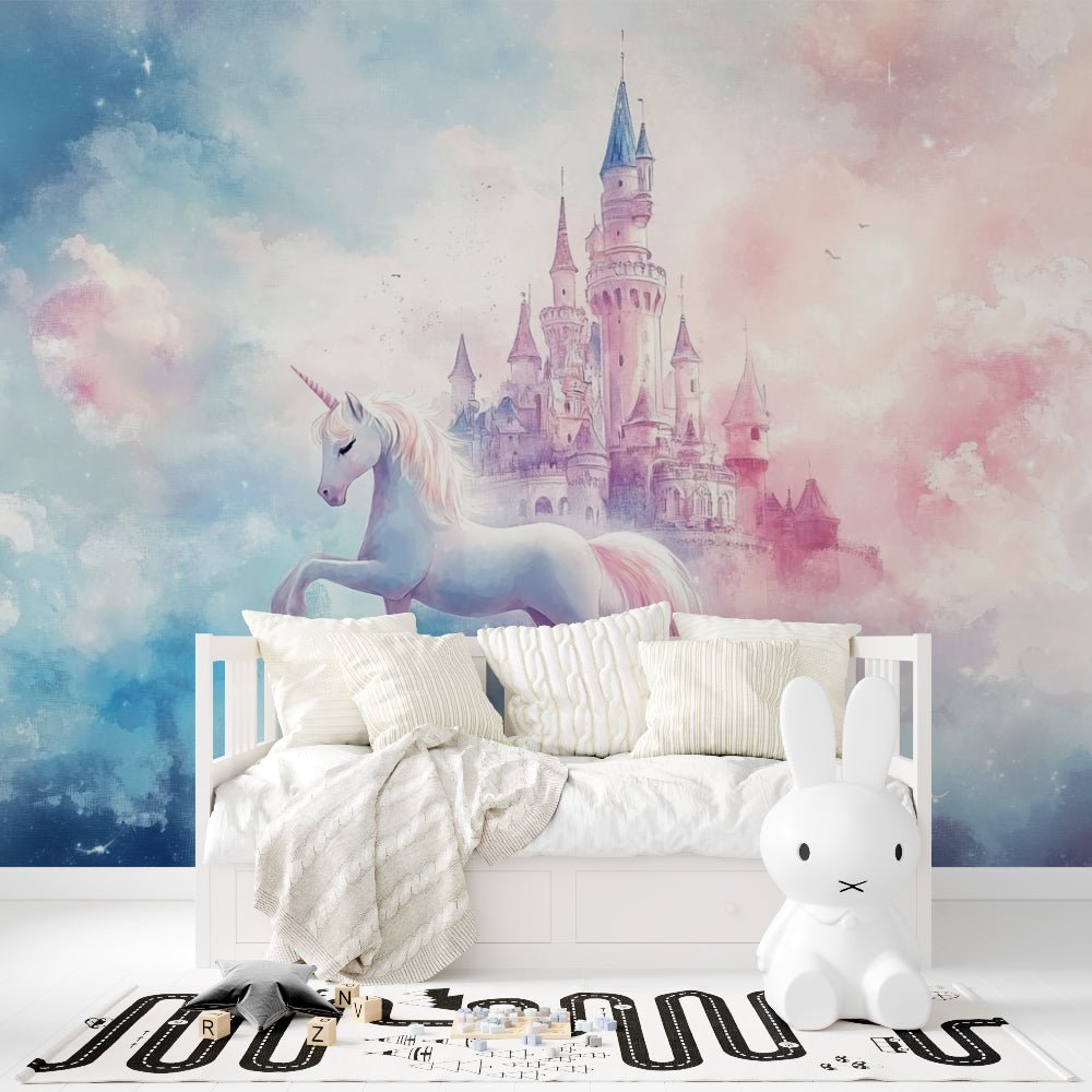 Unicorn and fairy castle mural wallpaper in pink and blue clouds shown in children's bedroom with white daybed