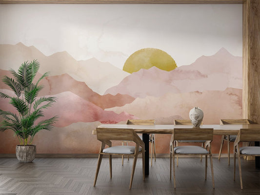Mountain sunset mural wallpaper in dining room with terracotta tones and golden sun