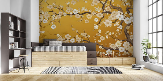 Japanese cherry blossom mural wallpaper in modern bedroom with platform bed and wooden storage