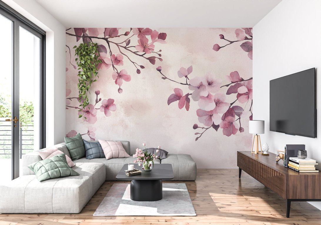 Cherry blossom mural wallpaper in contemporary living room with gray sectional sofa