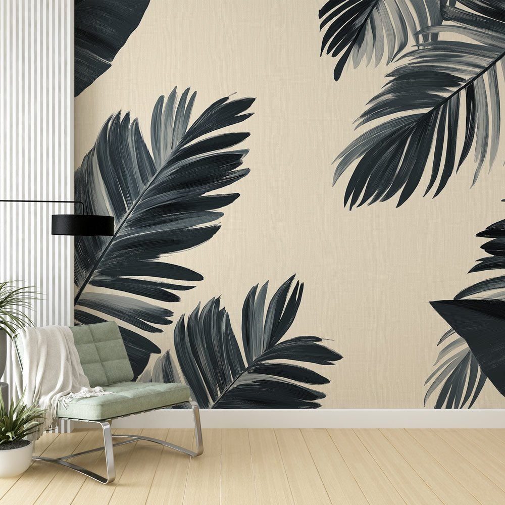 Elegant palm leaves mural wallpaper in black and beige showing large tropical fronds in a modern living room setting