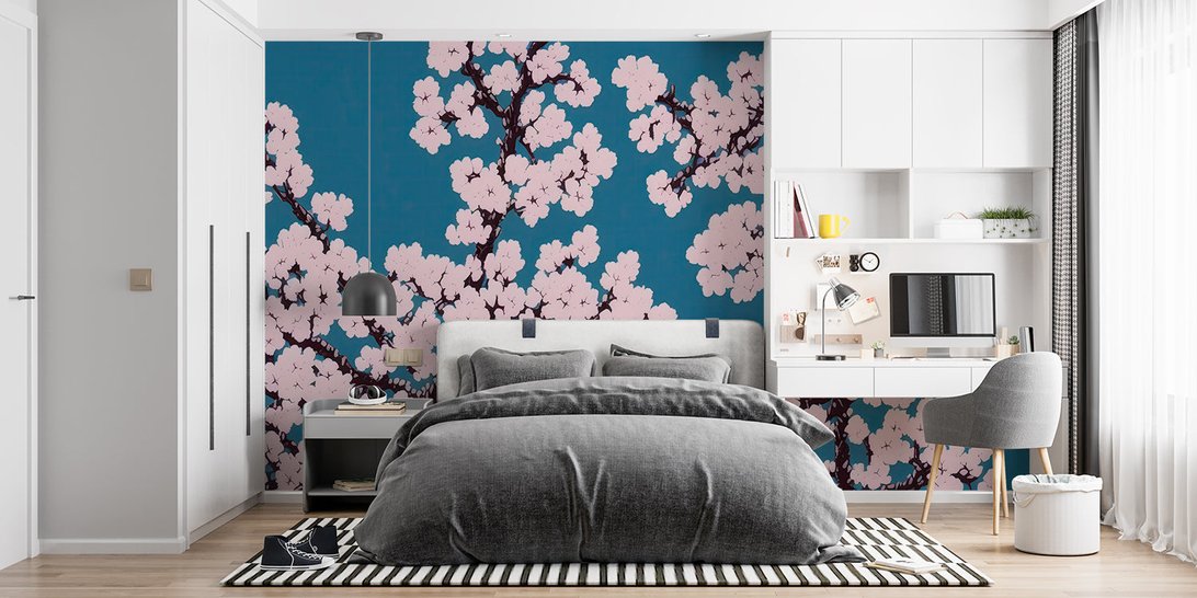 Japanese-inspired room with sakura mural wallpaper and modern furnishings