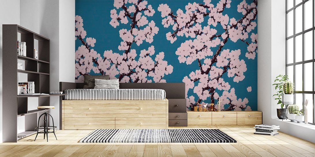 Full wall view of cherry blossom mural wallpaper in contemporary space