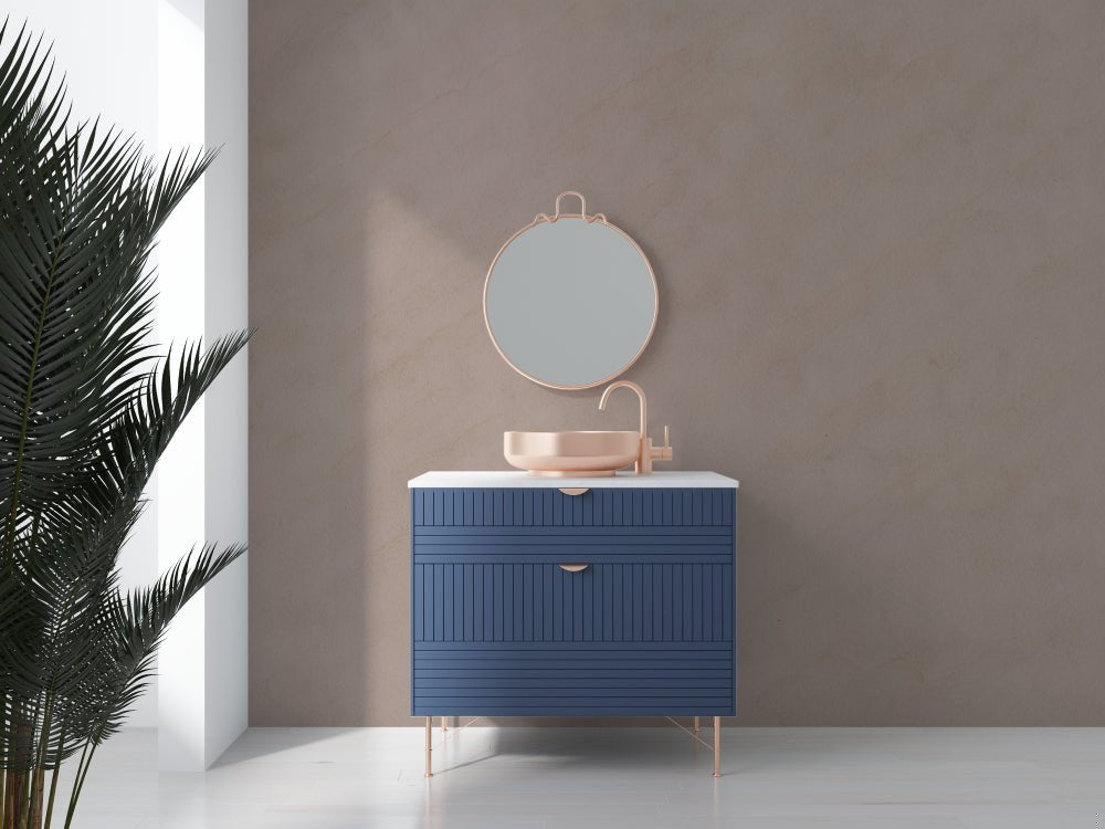 Elegant taupe mural wallpaper with mineral texture in modern bathroom with blue vanity