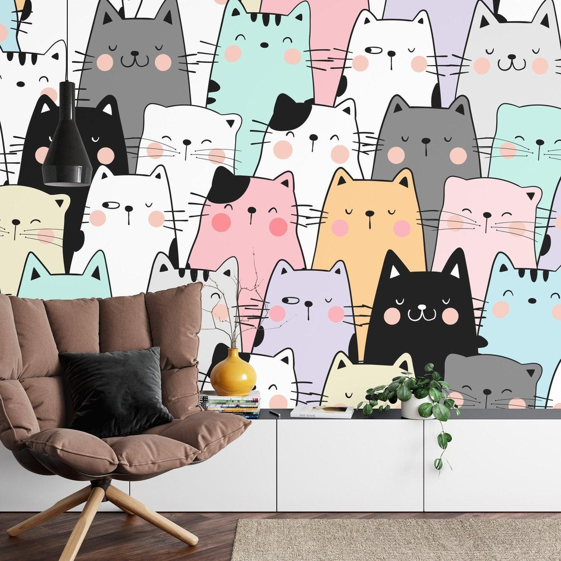 Kawaii cat mural wallpaper with pastel colored cute cat faces in living room setting