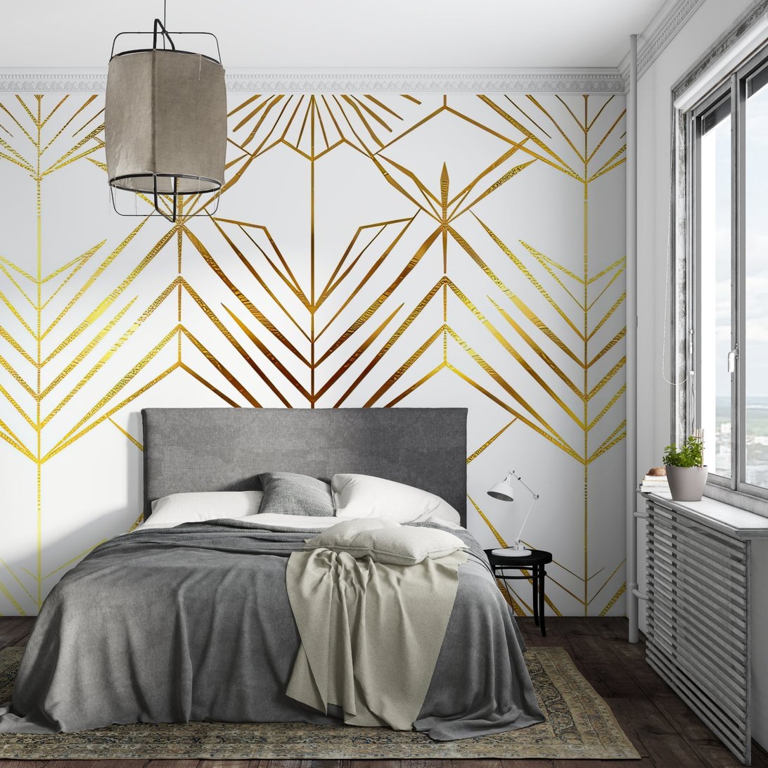Art Deco gold geometric mural wallpaper in contemporary bedroom with grey bedding