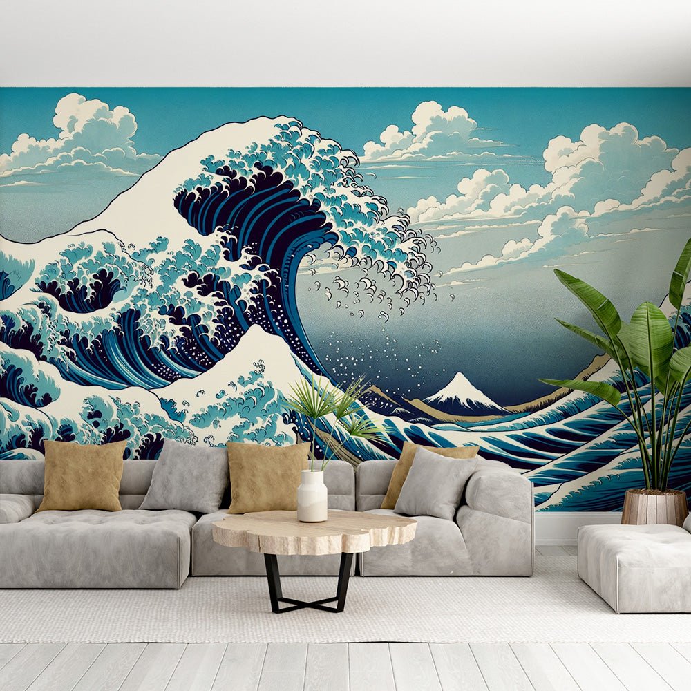 The Great Wave of Kanagawa Japanese mural wallpaper shown in a modern living room setting with gray sofa and decorative plants