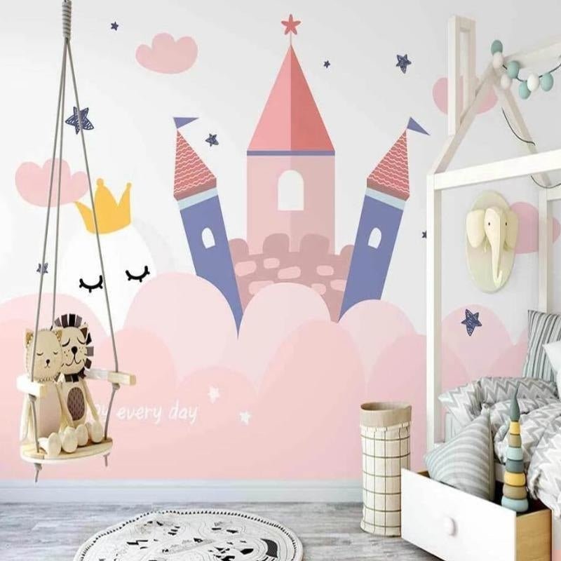 Princess castle mural wallpaper with swing and modern nursery accessories in soft pink and grey tones