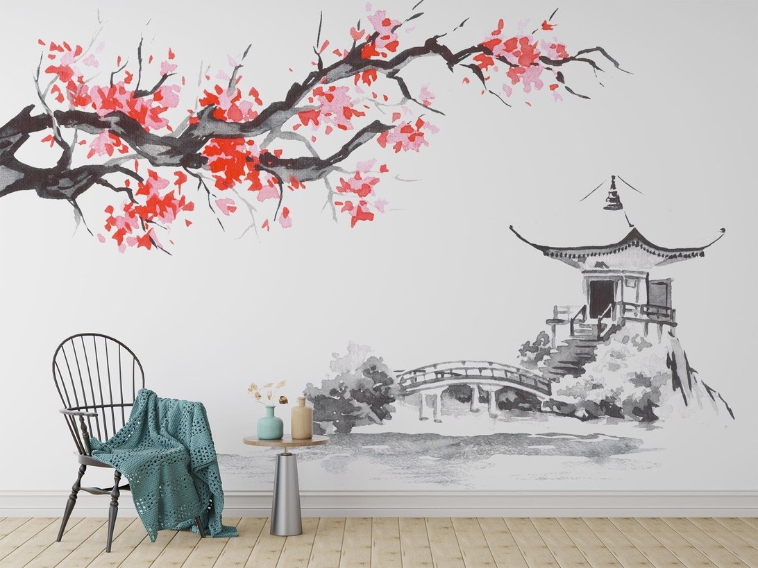 Japanese cherry blossom mural wallpaper with traditional temple and bridge, shown in modern interior setting