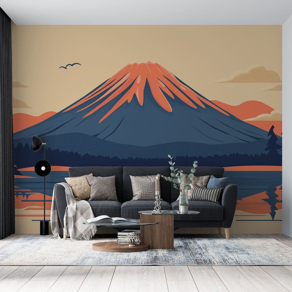 Mount Fuji mural wallpaper in coral and navy shown in a modern living room setting with gray sofa