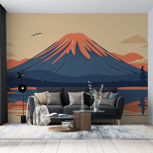 Mount Fuji mural wallpaper in coral and navy shown in a modern living room setting with gray sofa