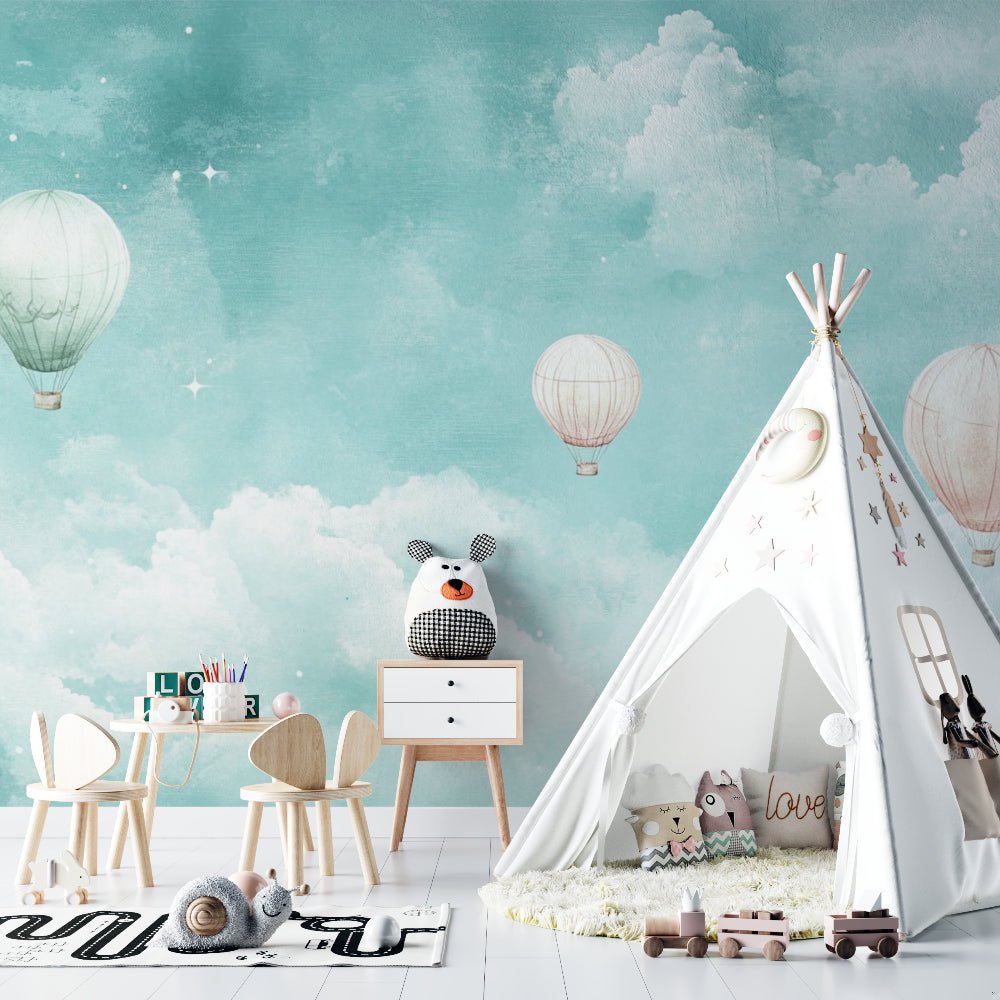 Children's room featuring hot air balloon wall mural with teepee and play area
