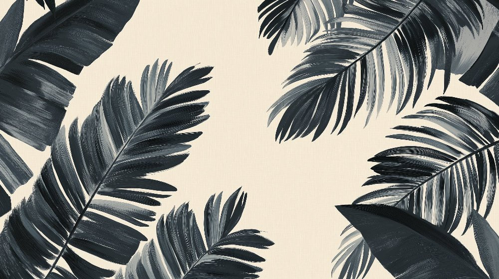 Close-up detail of black palm leaves pattern on beige background mural wallpaper