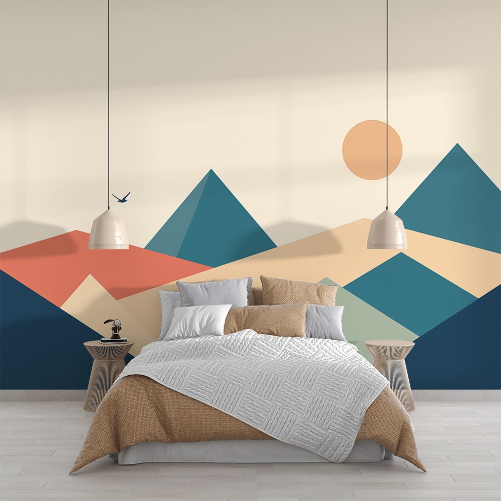 Mountain mural wallpaper with geometric design in terracotta and teal shown in modern bedroom setting